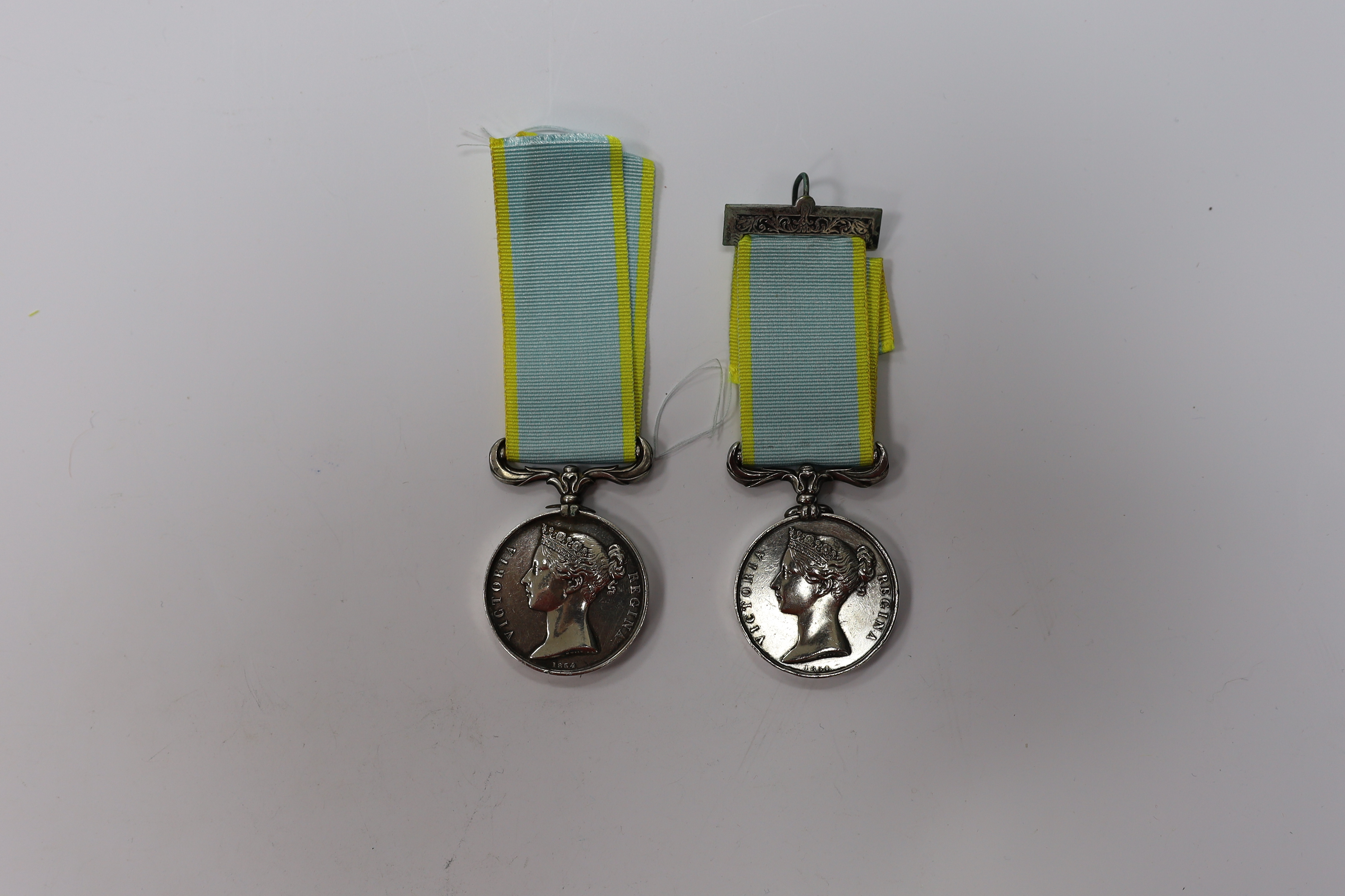 Two Crimea medals, one with Inkermann clasp, both unnamed as issued